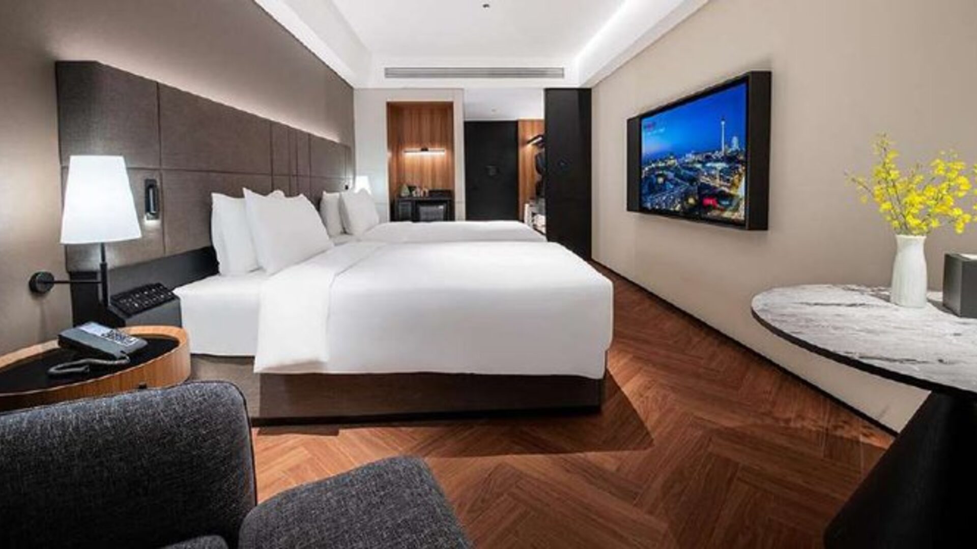 Hotel guest room furniture package by YAJU: beds, nightstands, lounge chair and writing desk